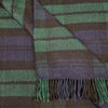 Striped fabric with green, brown, and purple colors