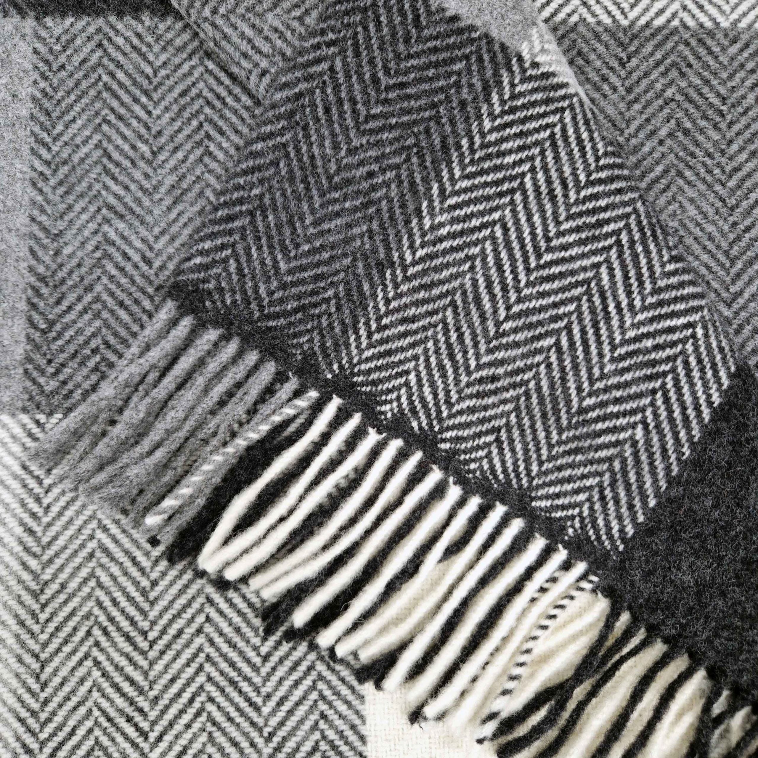black and white herringbone patterned throw