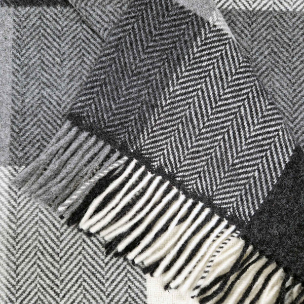 black and white herringbone patterned throw