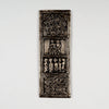 Decorative metal panel with intricate designs on a white background