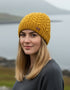 Erin Aran Cable Pullon Hat | Sunflower