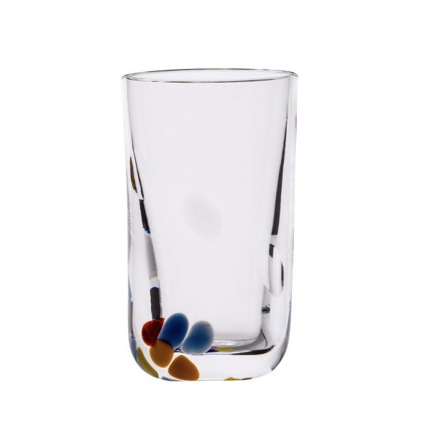 A clear shot glass with multicolored floral patterns at the base, handmade with etched designs.