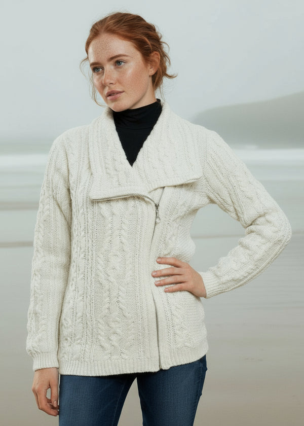Woman wearing a cream cable knit aran  cardigan