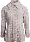 Knitted cardigan with button details on a white background