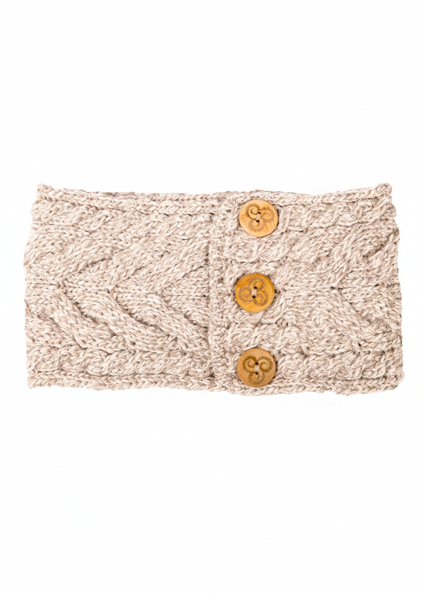 Knitted headband with three buttons on a white background