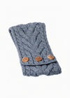 Folded blue knitted Headband with wooden buttons on a white background