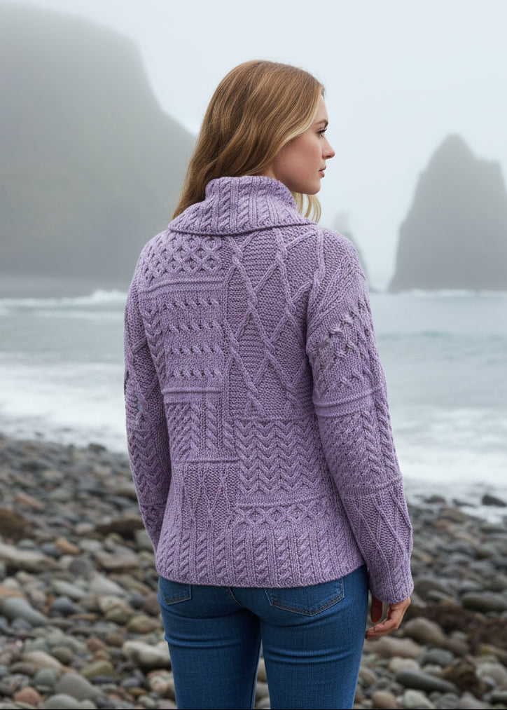 Woman wearing a purple aran knitted cardigan