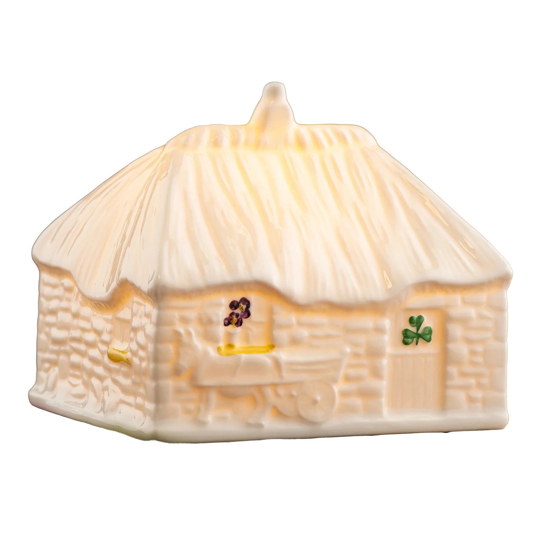 Ceramic house-shaped candle with a white base and yellow roof on a white background