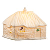 Ceramic house-shaped candle with a white base and yellow roof on a white background