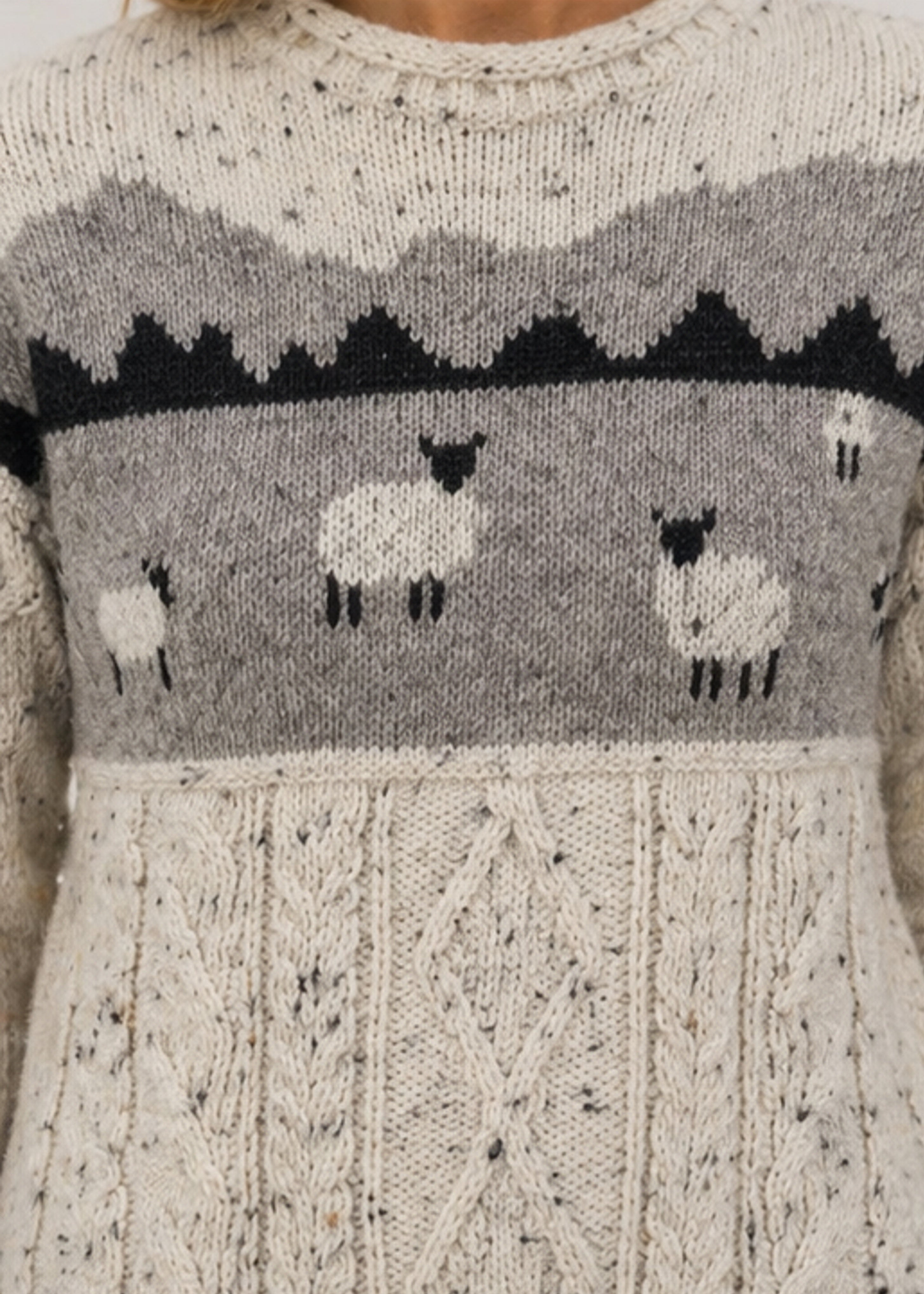 Knitted sweater with sheep pattern