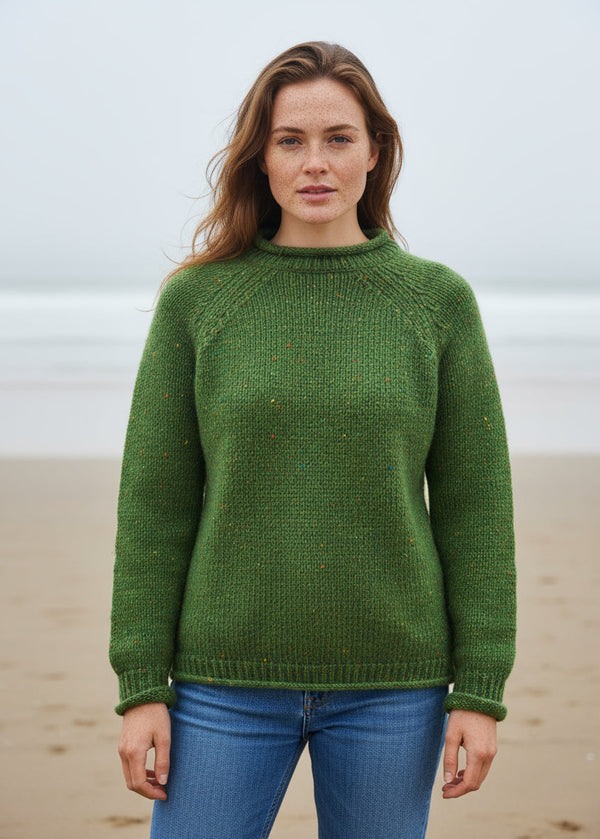 Green roll neck donegal tweed sweater