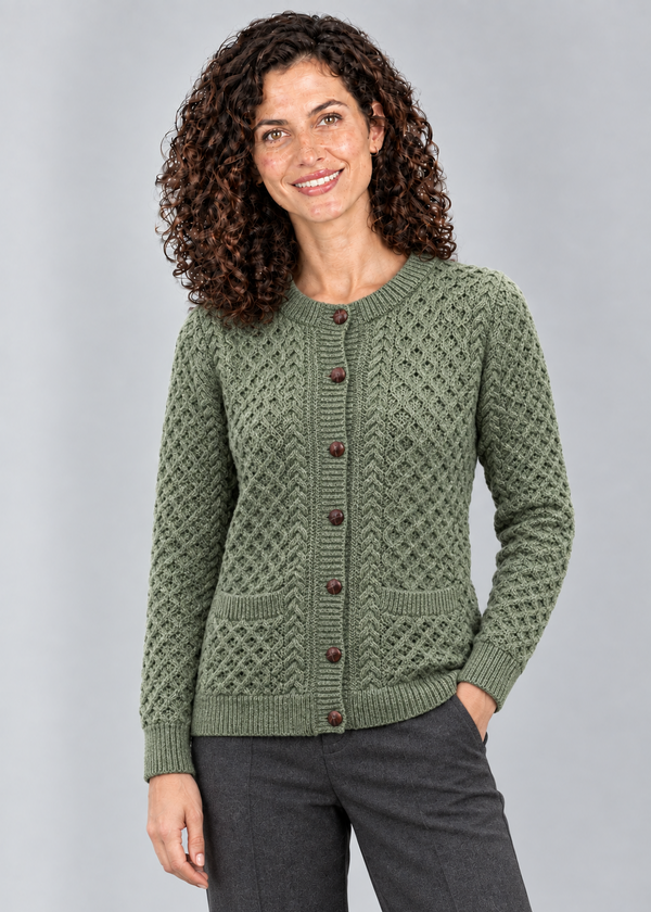 Green Leaf cardigan standing studio pose