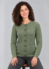 Green Leaf cardigan seated studio pose