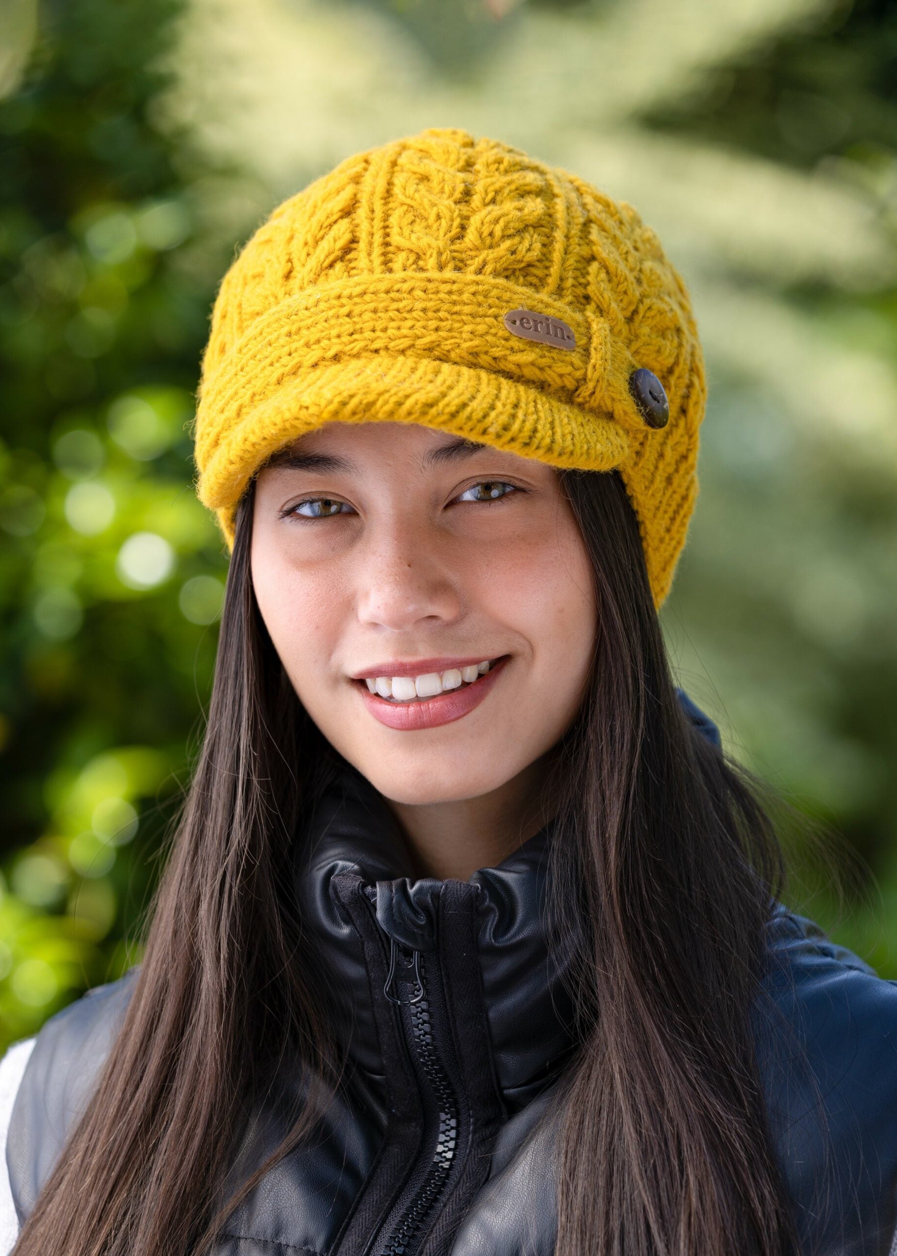 Erin Aran Cable Peak Hat | Sunflower