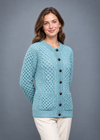 Aqua cardigan, angled studio pose