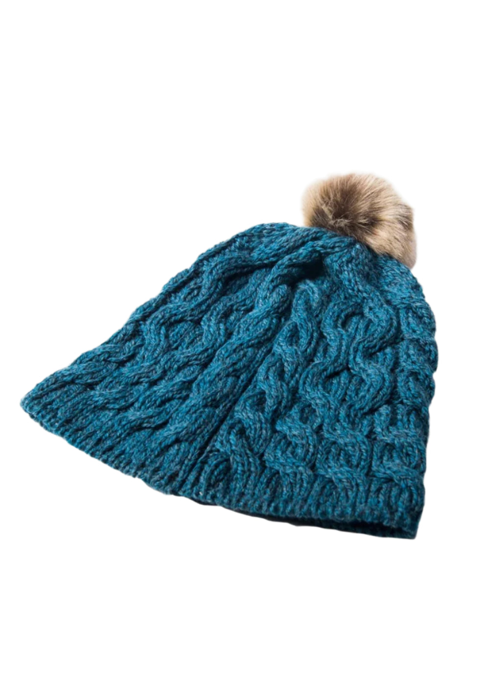 Blue knitted beanie with a fur pom-pom on a light gray background