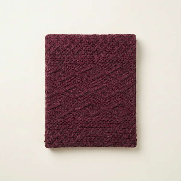 Burgundy blanket overhead flat lay