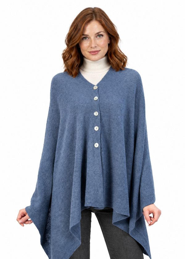 Cape with centre buttons, holding the edges