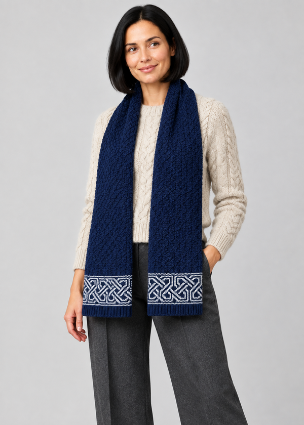 Celtic scarf over Aran knitwear, angled pose