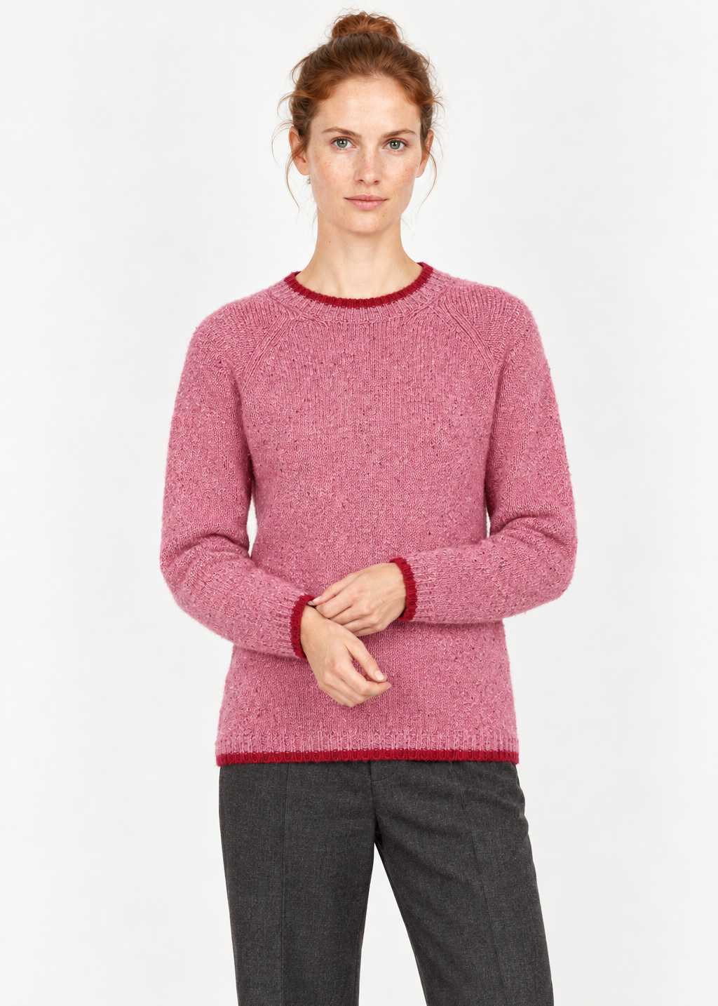 Cuff-adjusting studio pose