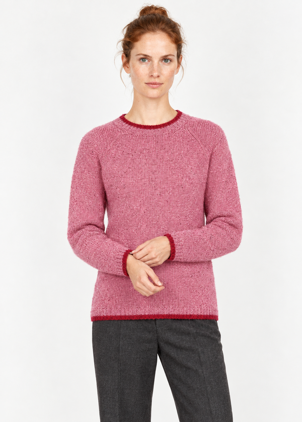 Cuff-adjusting studio pose