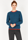 Cuff-adjusting studio pose