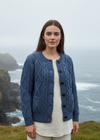 Denim Aran cardigan lifestyle coastal shot