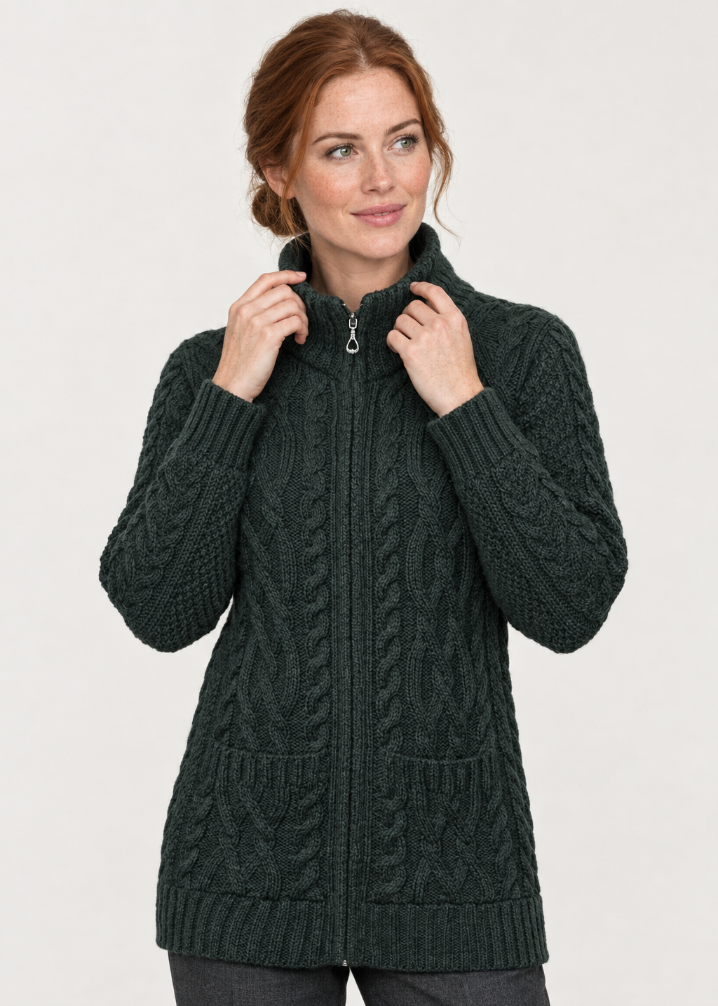 Green cardigan collar-holding studio pose