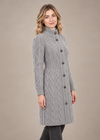 Grey coat, side three-quarter studio pose