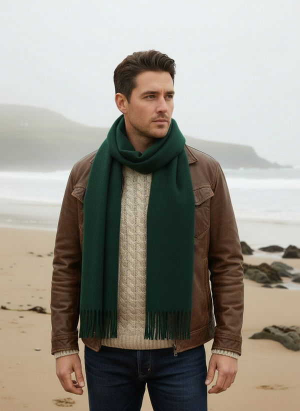 Man wearing Foxford Amazon Green scarf on Irish beach