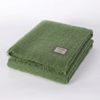 Foxford Dunloe sage green mohair throw folded on a white background