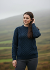 Model adjusting hair-Unisex Aran Wool Sweater | Traditional Irish Knitwear | Navy & Green