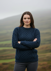 Model with arms crossed-Unisex Aran Wool Sweater | Traditional Irish Knitwear | Navy & Green