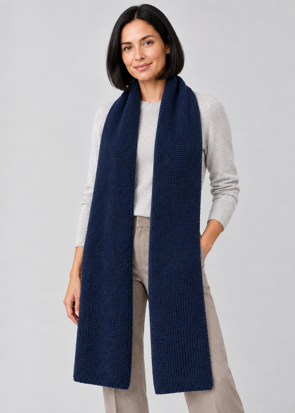 Navy scarf three-quarter studio pose