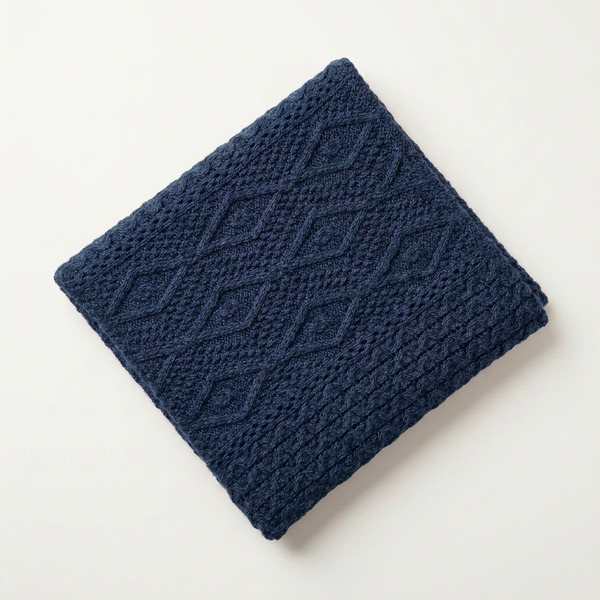 Ocean navy blanket diagonal flat lay