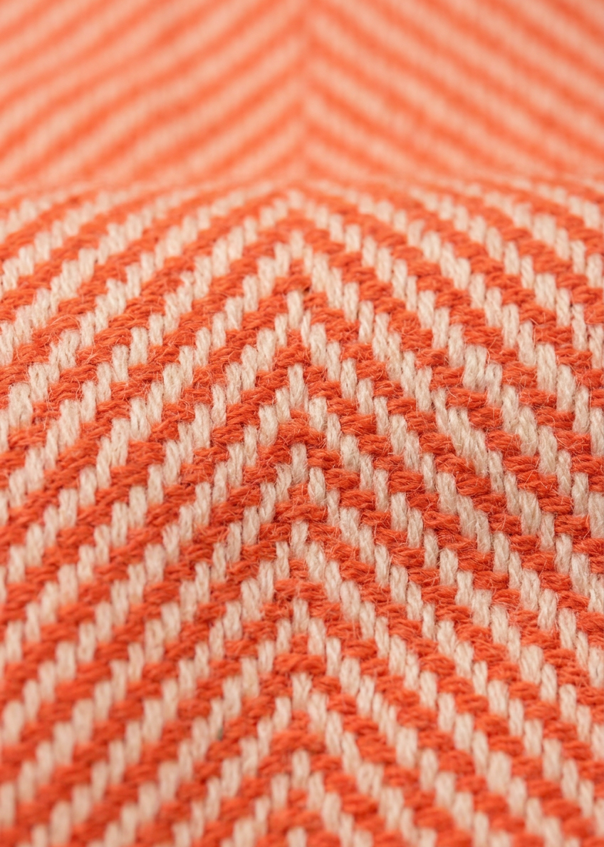 Orange-and-cream herringbone colour and weave detail
