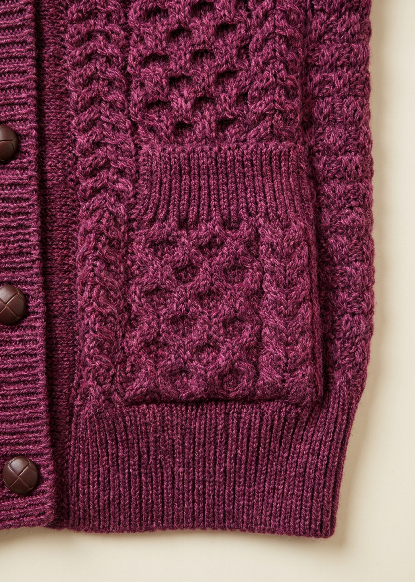Plum cardigan pocket and bottom hem detail