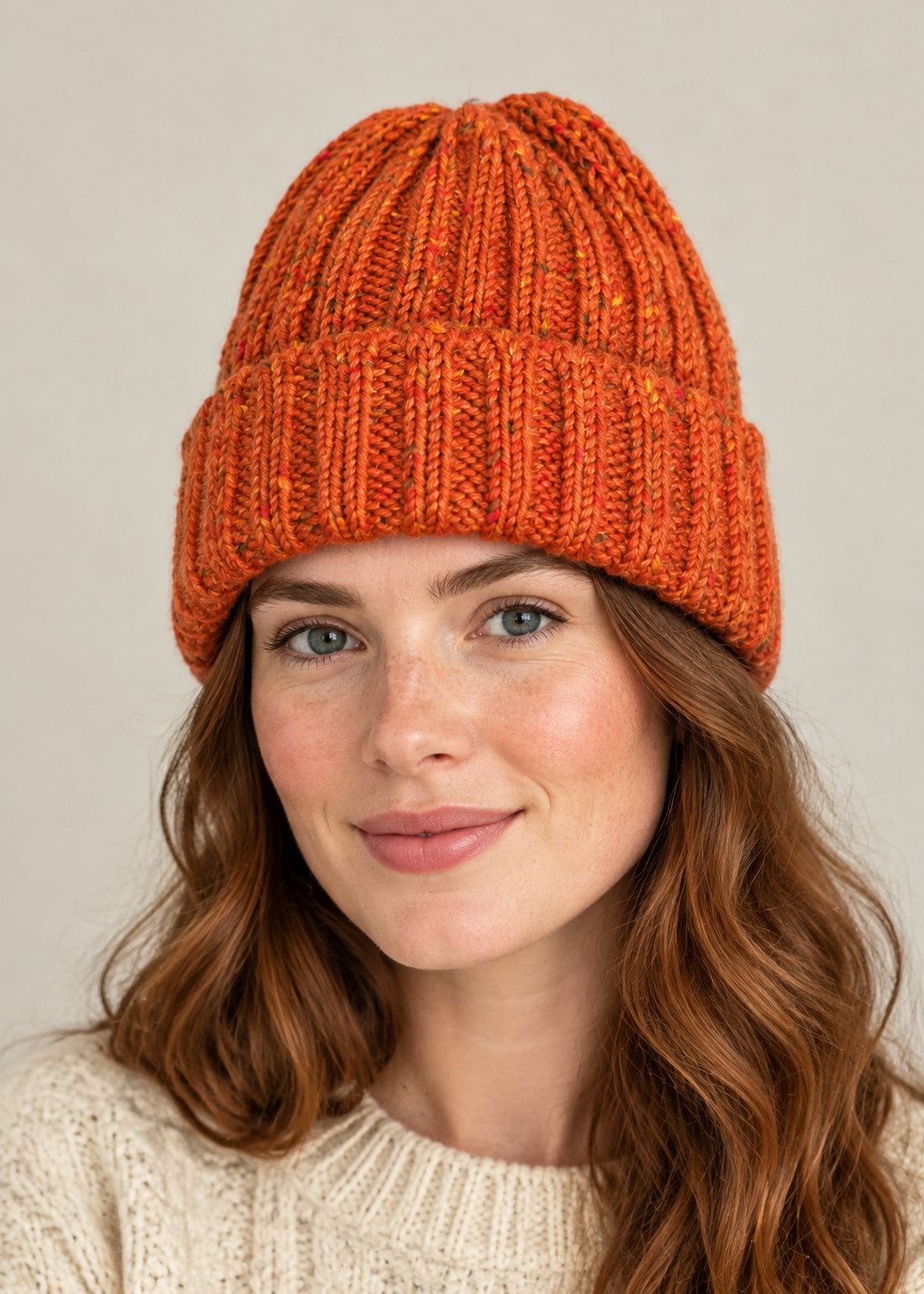 Rust orange Hill Walker Hat on a female model, head and shoulders