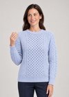 Sky sweater front conversational pose