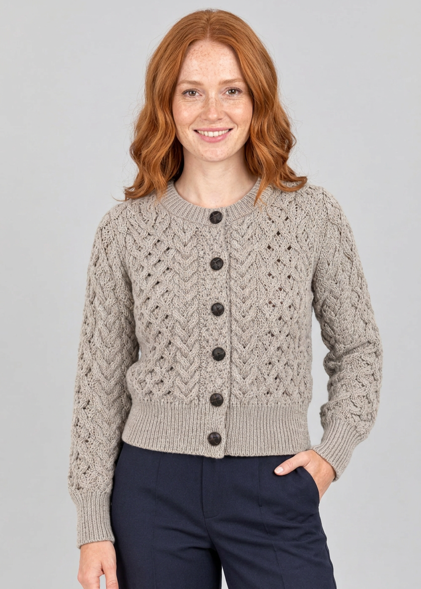 Three-quarter studio pose with hand in pocket