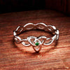 Sterling Silver Trinity Knot Ring with Green Cubic Zirconia